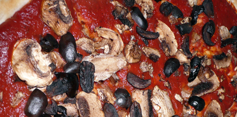vegan pizza at pizza hut: hand-tossed crust with olives and mushrooms