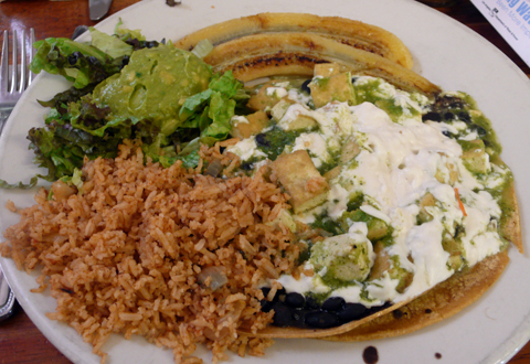 bob's breakfast (veganized): 2 corn tortillas covered w/ black beans, tofu, sauteed in a mild salsa verde. served with spanish rice, guacamole and grilled bananas. $9.95