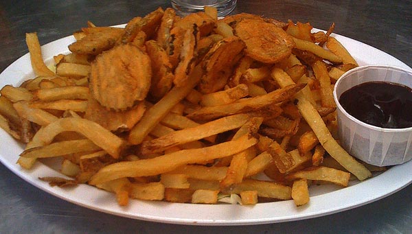 fried dill pickle chips and fries. $5