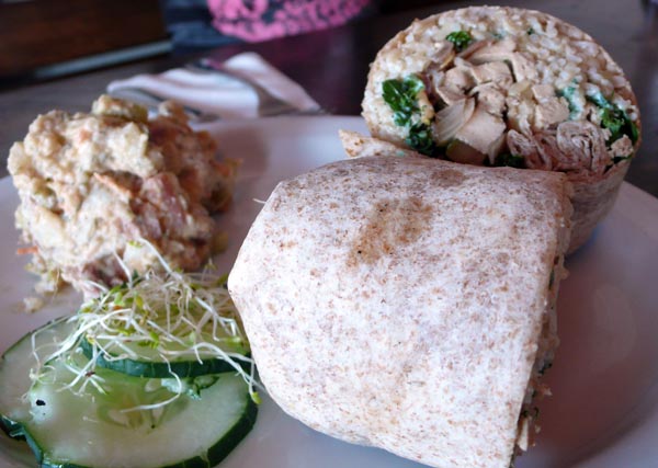 the wrap: stuffed with baked tofu, roasted vegetables, shredded kale and brown basmati rice with a drizzling of creamy tofu dressing wrapped together in a wheat tortilla. served with potato salad. $9.95