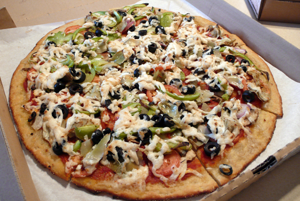 medium garden combo pizza: vegan mozz, white shrooms, red onions, fresh tomatoes, artichokes, green peppers and black olives. $14.99