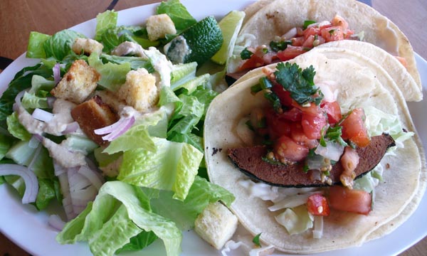 baja taco combo: 2 of our delicious veggie "fish" tacos with your choice of side. $10