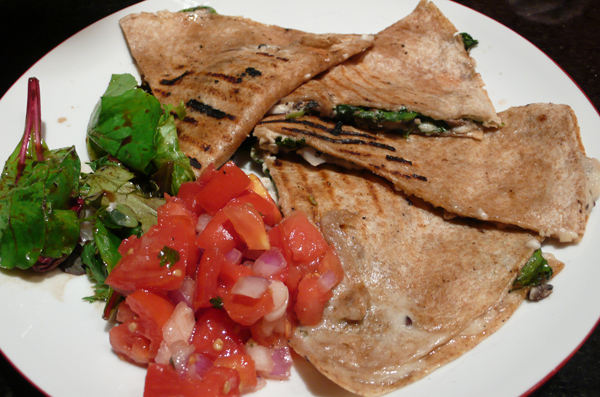 quesadilla: spinach and mushroom quesadilla layered with soy mozzarella and red onion in a whole wheat tortilla. served with a side of pico de gallo. $8.95