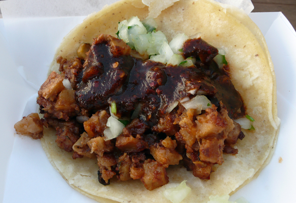 taco with soyrizo and salsa negra. $2.75