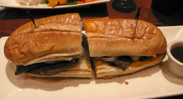 philly cheesesteak: tender marinated soy beef chunks layered over caramelized onions, sliced mushrooms, and melted vegan cheddar cheese served on toasted hero bread. $9.95