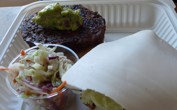 southwest burger: bean & grain burger with lettuce, vegan soy cheese, guacamole and ancho chili spread. $9.95
