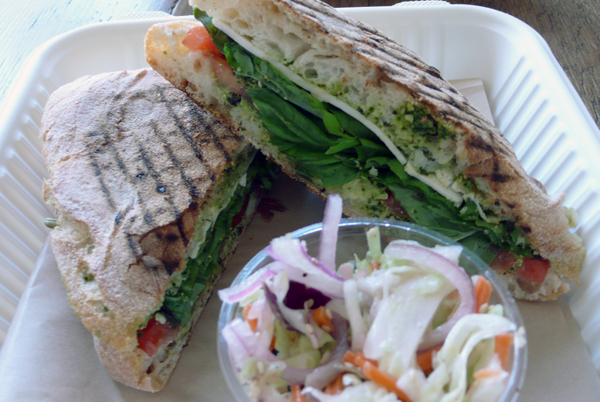 soyrella, tomato and basil panini: tomato, fresh basil, vegan soy cheese and pesto sandwich. freshly grilled and served with coleslaw. $8.95