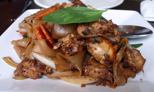 pad kee mao "drunken noodles" plus veggie chicken: pan-fried flat rice noodles with carrots, mushrooms, onions, bell peppers, basil, chili and choice of protein. $8