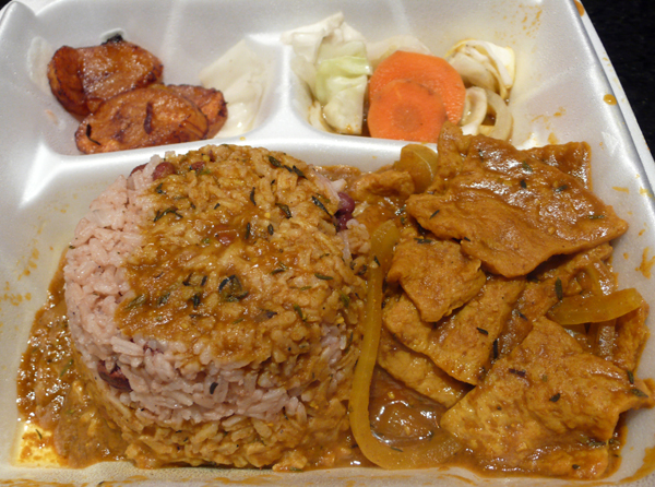 vegan curry chicken: Soy chicken cooked in spicy Jamaican curry sauce w/ butter soft gold potatoes. served w/ rice & peas, cherry tomatoes, and plantains. $9.75