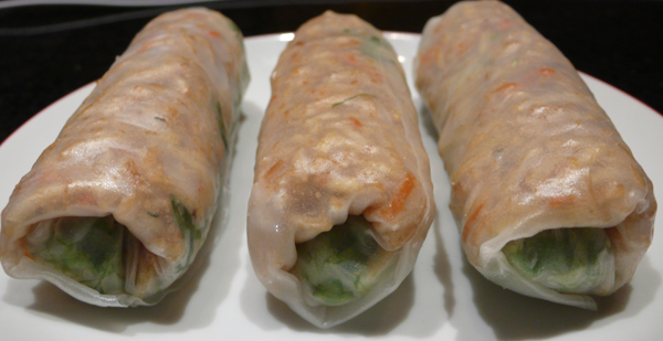veggie spring rolls (3): green leaves and shredded fried tofu wrapped in rice paper. served with coconut sauce. $4
