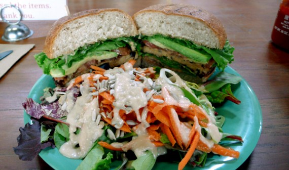 the bridge burger: tempeh patty with lettuce, tomato, avocado with thousand island dressing on organic whole wheat bun. served with an organic house salad. $10.75