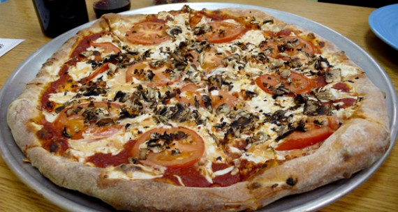 purgatory pizza covered in teese cheese. the best vegan pizza in los angeles, or anywhere for that matter.