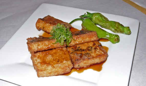 spicy fried tofu: fried tofu with spicy soy sauce and green onion. $4.95