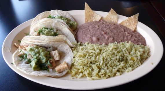 tofu tacos (no cheese!): 3 soft tacos with marinated tofu, cilantro, onion and guacamole. served with rice and beans. $6.95