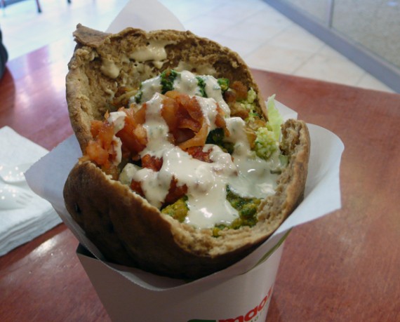 maoz falafel sandwich with hummus and unlimited salad bar. ...before going back for more toppings!
