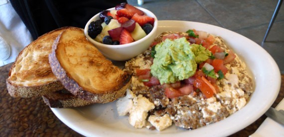 angel's mess: tofu scrambled with vegan sausage and casein-free soy cheese. served with your choice of toast and a delectable fruit cup. $11.95