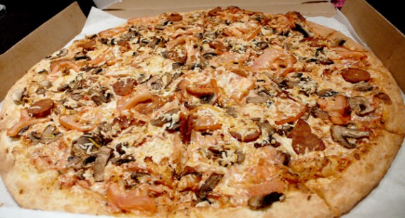 large daiya cheese pizza with mushrooms, tomato, garlic and vegan sausage. $20.99