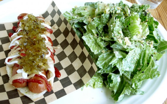sausage fest: 2 soy hotdogs wrapped in a blanket with dijon, ketchup, mayo and relish. served with a caesar salad. $6.50