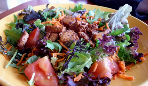 swingers salad with tofu: organic mixed baby greens, tomatoes and carrots with choice of dressing and sauteed tofu. $9