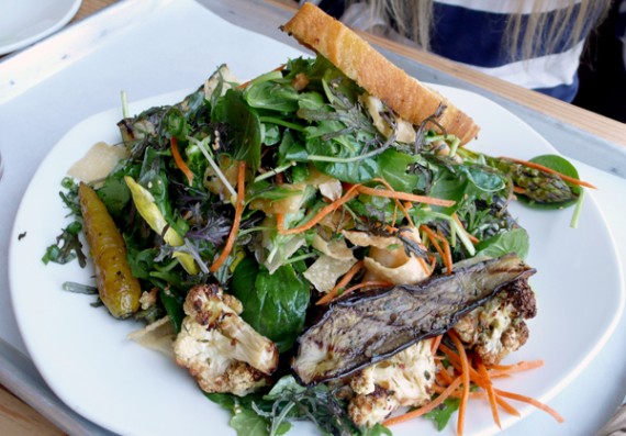 chinese chicken salad with no chicken, add roasted vegetables. spicy greens, golden pea sprouts, carrot, crispy wonton, cilantro, green onions, roasted peanuts, tomato dressing. $10.5
