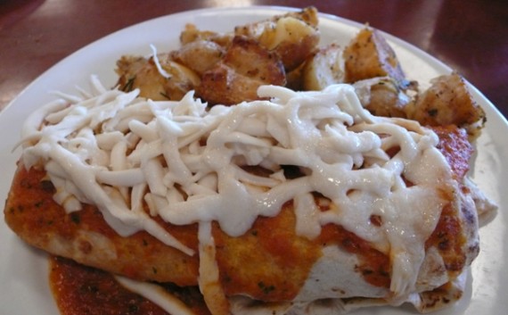 vegan breakfast burrito with scrambled tofu, vegan cheese, and breakfast potatoes. $11