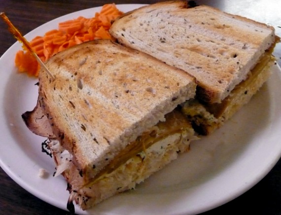 the reuben: thinly sliced wheatmeat, cottage-style tofu, sauerkraut, mustard and vegenaise on oversized rye bread, oven-baked. served with dill pickle and thousand island dressing. $10.75