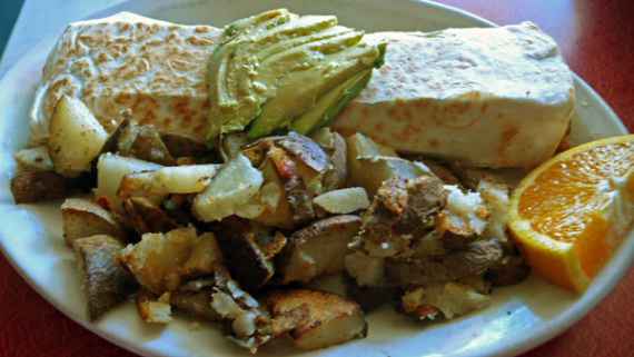 vegan breakfast burrito: tofu, veggie beans, veggie sausage, avocado and red or green salsa served with home fries. $7