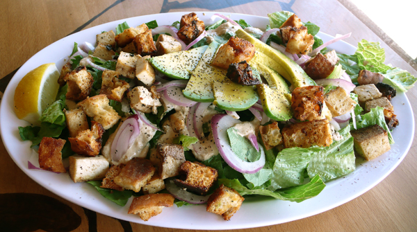 cesar salad with tofu: romaine lettuce topped with grilled tofu, sliced avocado, onions, croutons and our lemon-garlic César dressing. $8