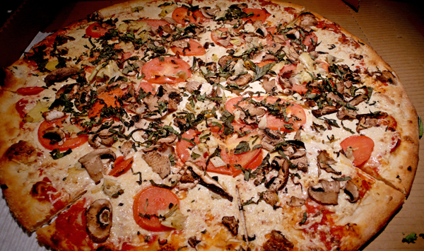vegan provence pizza with daiya cheese. hold the capers, add mushrooms.
