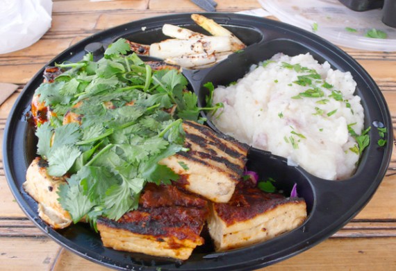 vegan feast: tofu trio (teriyaki, tomato and ginger olive) on a bed of red cabbage. $9.95 